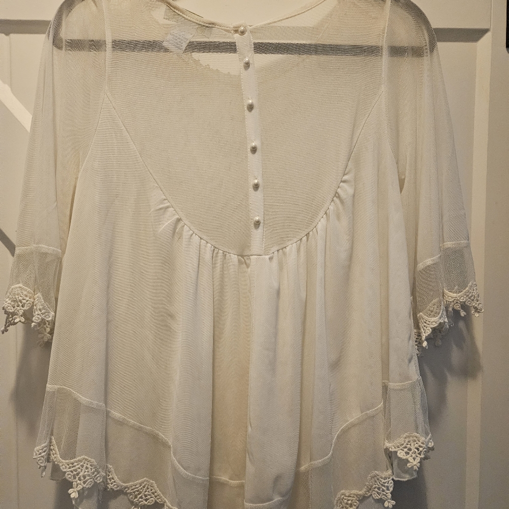 Gorgeous embroidered bib front top
